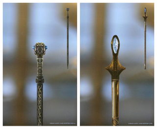 Illustration for article titled Avengers concept art takes a closer look at Loki's staff and Hawkeye's arrows